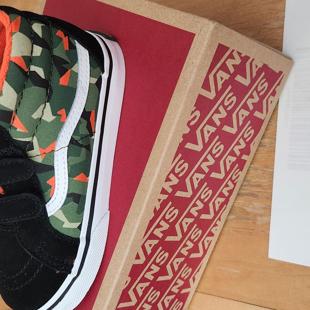 Vans Camo and Black High-Top Sneakers